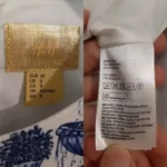 پیراهن مجلسی گلدار کوتاه سفید آبی اچ اند ام H&M