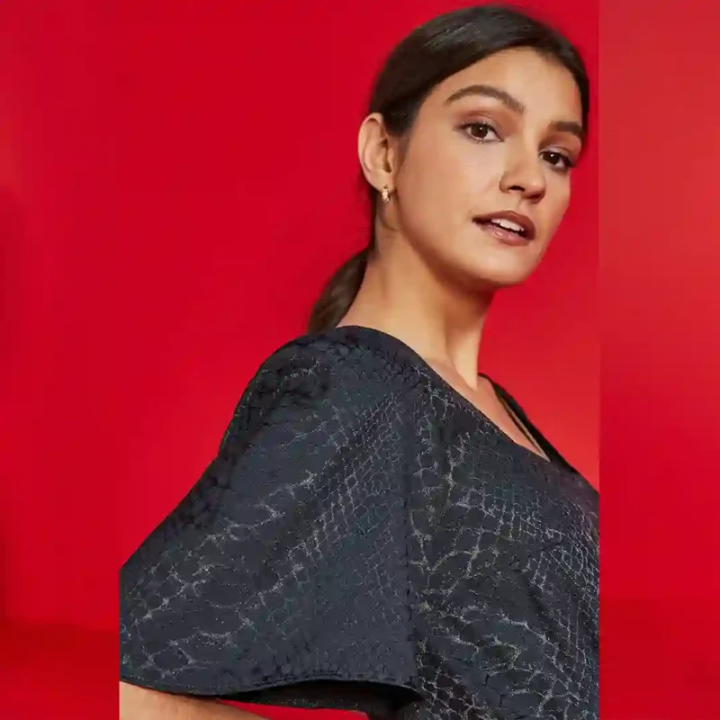 جامپسویت اورال سرهمی پوست ماری مشکی نکست